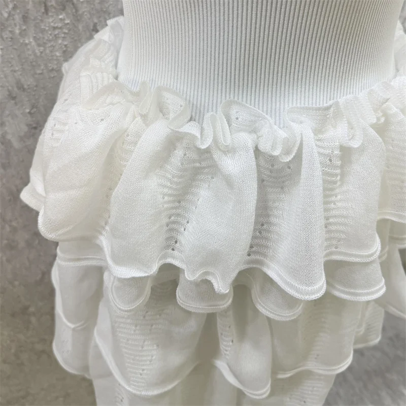 Immagine 6: Abito da donna nuovo in maglia elasticizzata, mini abito slim per l'autunno 2026, abito corto senza maniche con volant a strati, abito da festa scavato