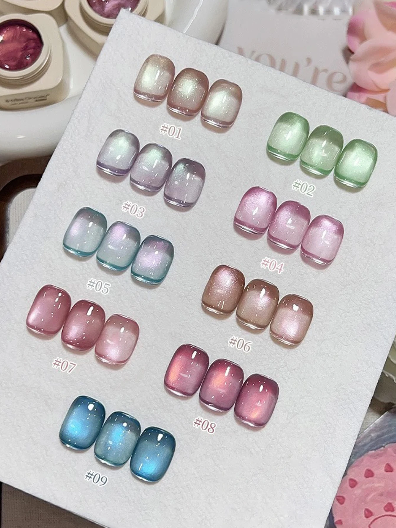 9PCS2025 جديد مسمار الفن موضة العلاج بالضوء الزجاج الخرز الصقيل الحلوى الملونة كريستال القط العين شفافة جيل طلاء الأظافر ، يدوم