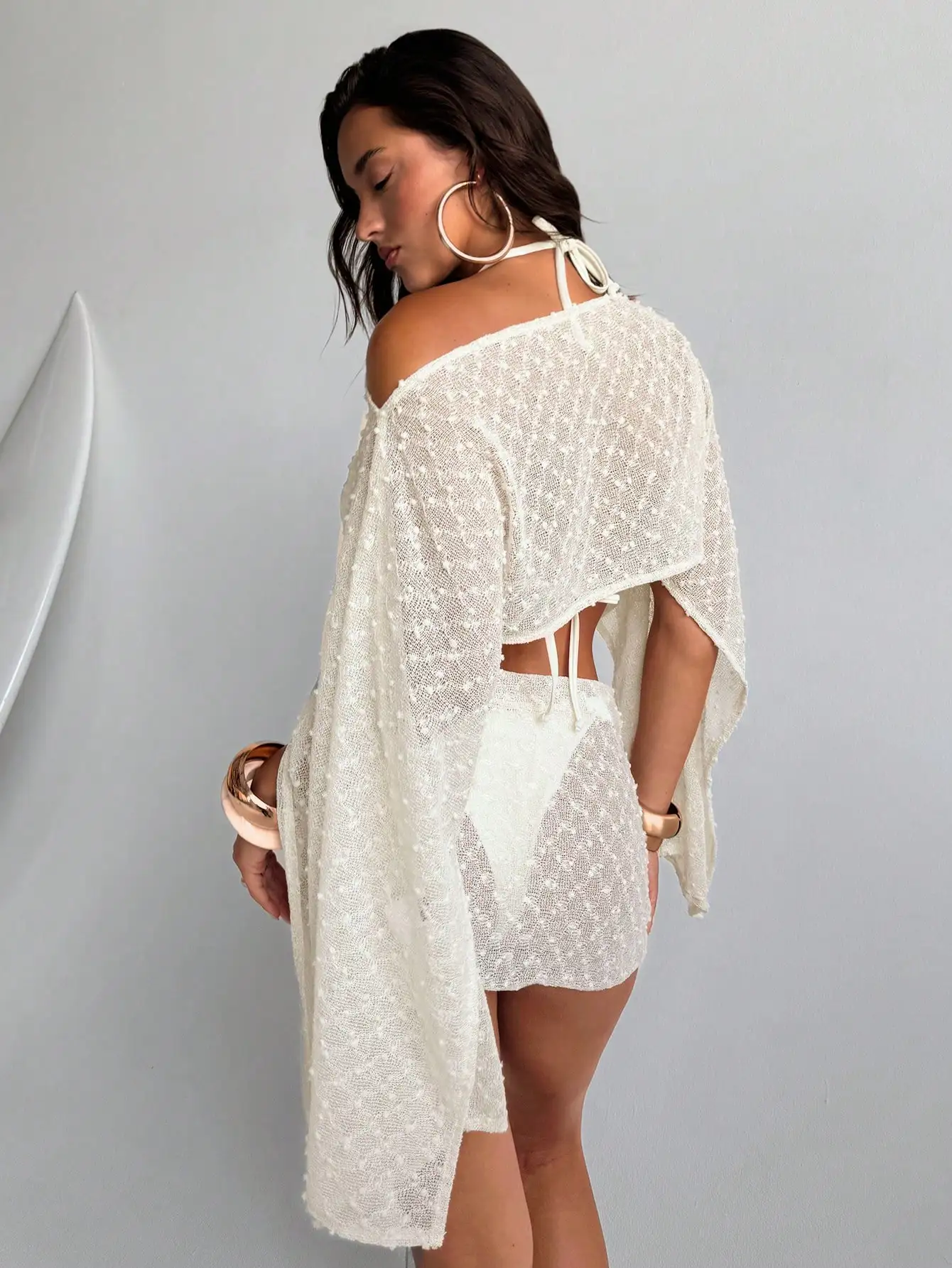 

Elegant Off-Shoulder Crochet Two-Piece Set: Shawl Top & Cut-Out Mini Skirt For Beach, Resort, Vacation And Summer Parties