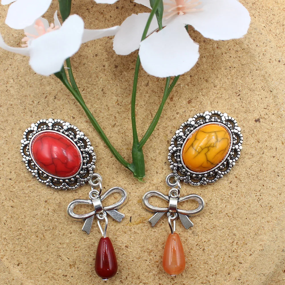 Factory direct sales 4pcs/lot antique silver hollow bow cracked flower plate pendant DIY mobile phone chain headpiece hand sewn