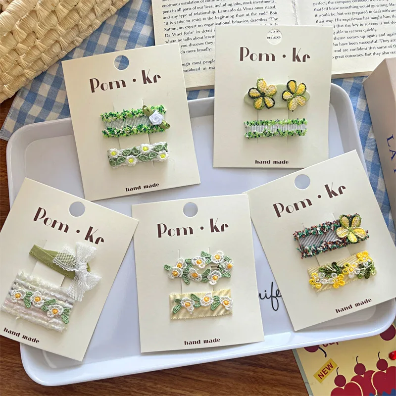 2 ピース/セット韓国ファッションイン生地ヘアクリップ子供のための女の子緑黄色花弓子供バレッタかわいいヘアアクセサリー