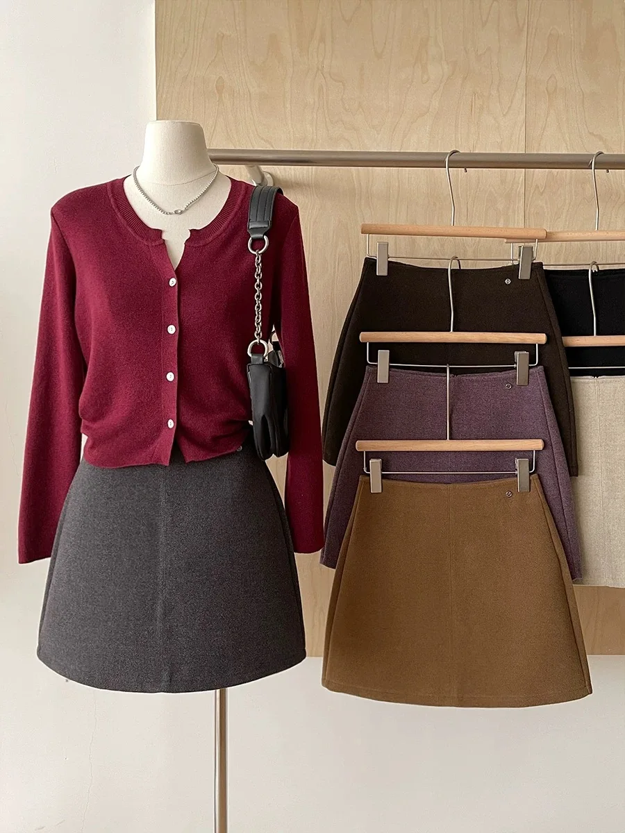 المرأة الخريف الشتاء بلون ألف خط تنورة قصيرة سيدة عارضة عالية الخصر الصوف ومزيج تنورة صغيرة