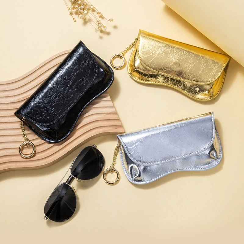 

Leather chain sunglasses case with fashionable crack pattern for ladies, small and unique eyewear bag that is versatile and port