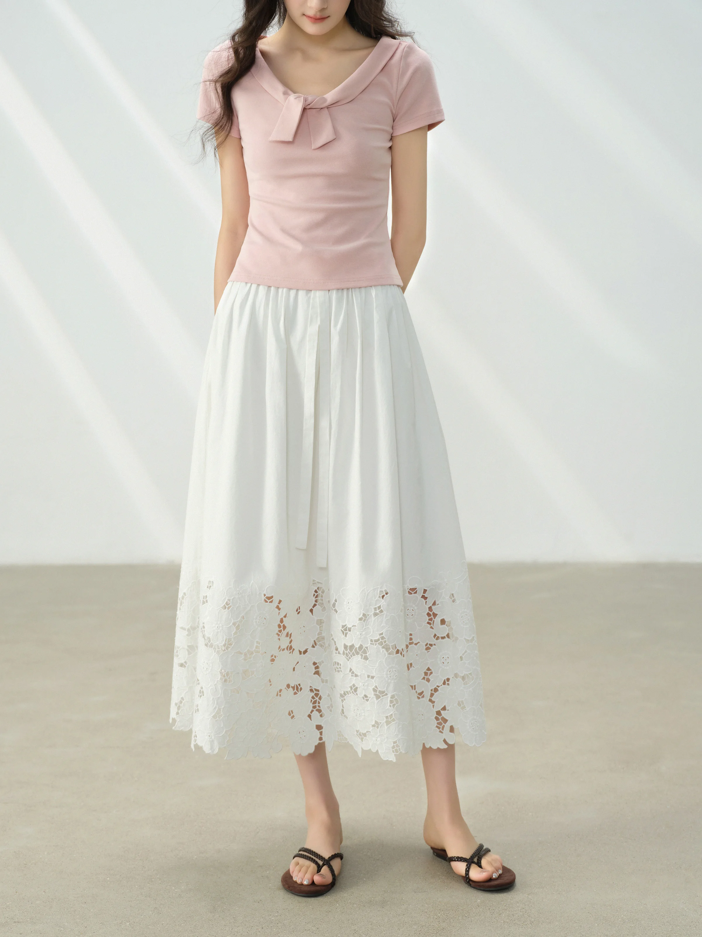 Jupe mi-longue trapèze blanche élégante pour femmes, taille haute, broderie creuse, ourlet en dentelle, Style coréen, tenue Chic décontractée pour filles, été