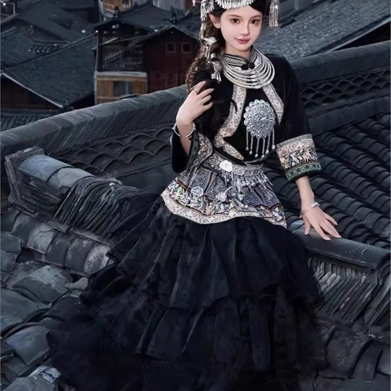 Embroidery Miao costume female ethnic style studio photo