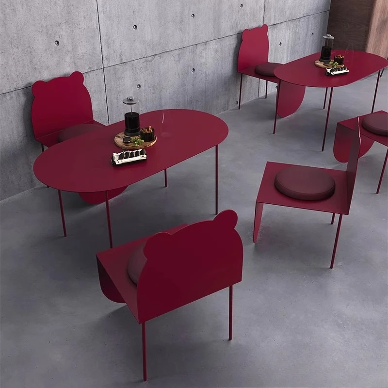 Creative retro industrial style round, outdoor cafe, bar, dining tables and chairs outside milk tea
