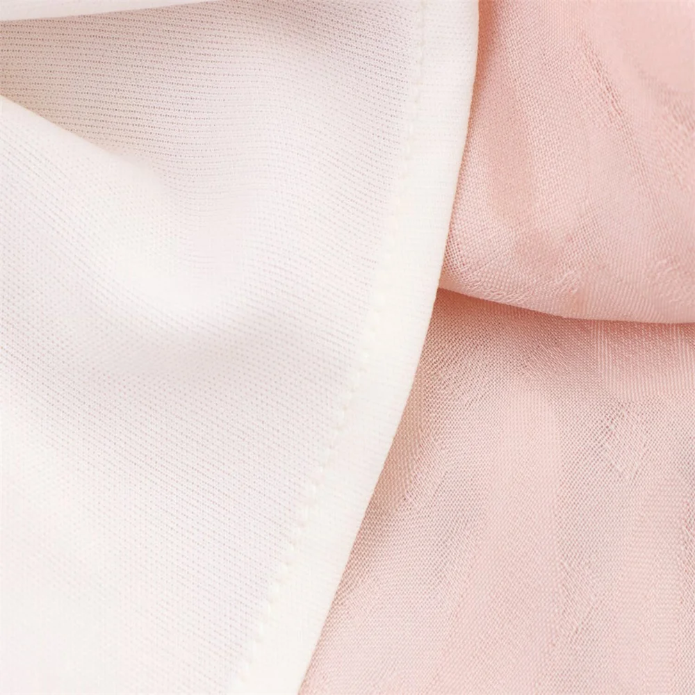 فستان ميدي صيفي جديد بنمط عصري معلق بياقة عنق بدون أكمام وشرابة مزخرفة