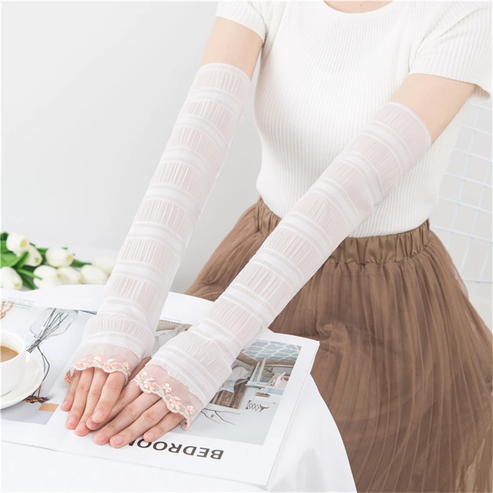 Korean women are pure color summer anti-ultraviolet thin style driving loose lace pearl ice silk sleeve ZT021