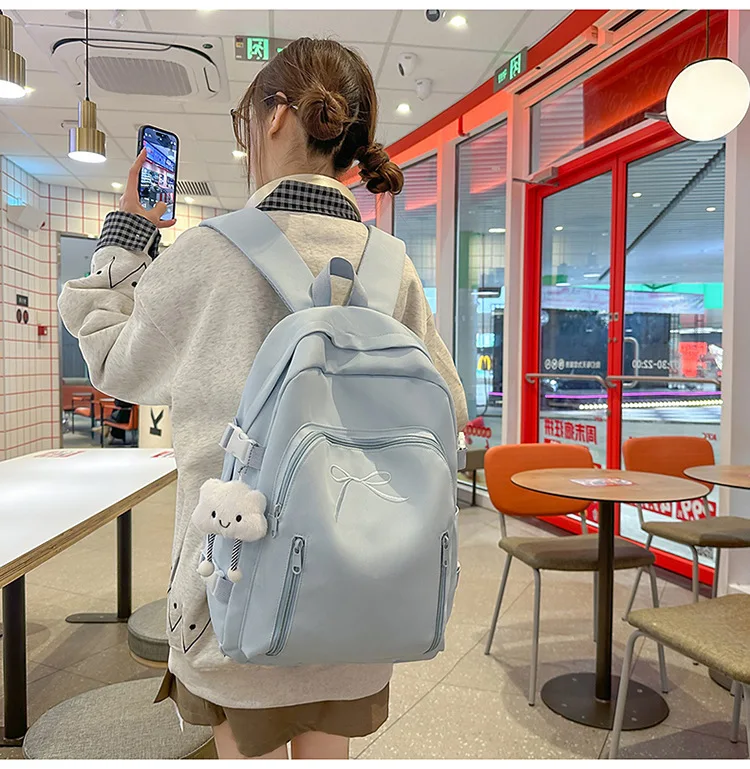 

Высокоэстетический однотонный рюкзак с вышивкой и бантом, нишевый, легкий, уменьшающий нагрузку, для поездок на работу, рюкзак большой вместимости