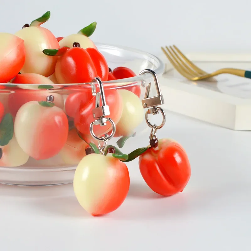 New Simulation Peach Keychain Creative Fashion Fruit PVC Honey Peach Photography Model Props Car Bag Pendant Ornament Gift Women