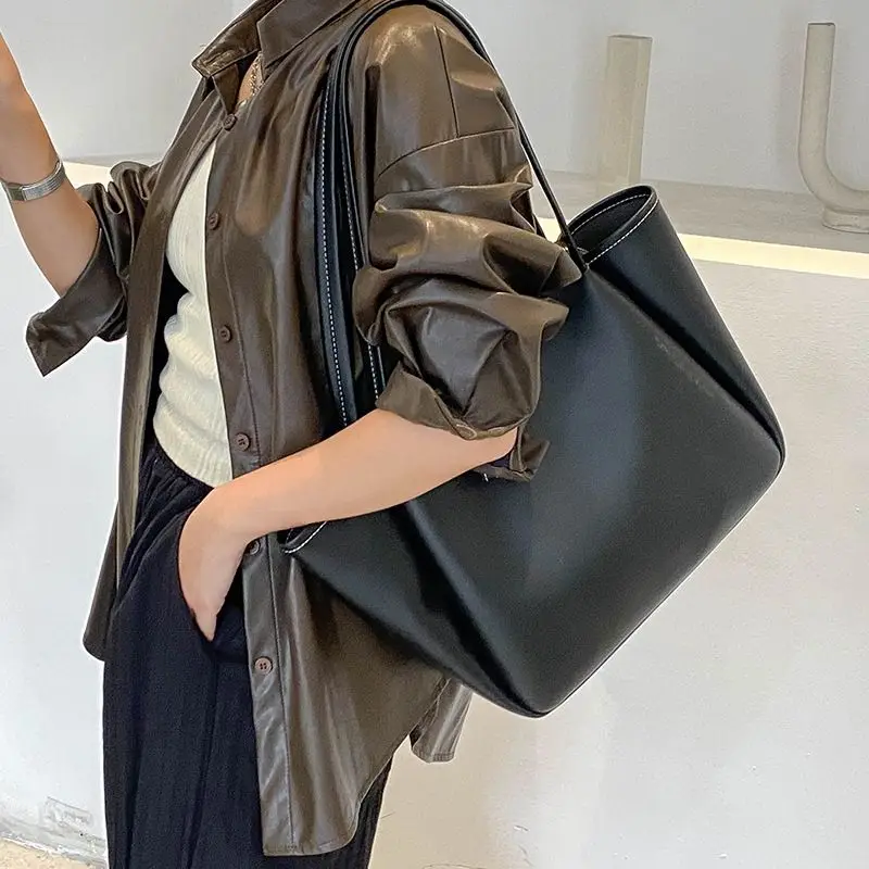 Europe And The United States Fashion Large Capacity Tote Bag Casual Simple Everything Advanced Sense Wing Design Shoulder Bag