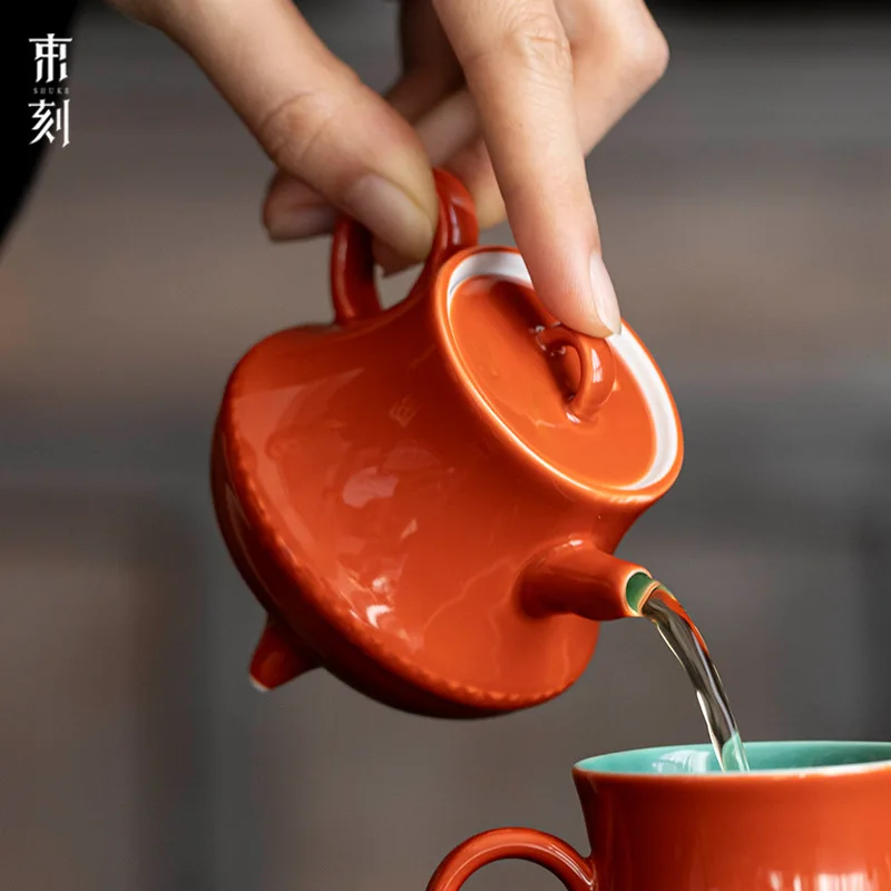 White Porcelain Teapot Turquoise Glaze And Natural Mineral Color Three-Legged Ceramic Zen-Style Tea Pot With Ball-Shaped Filter