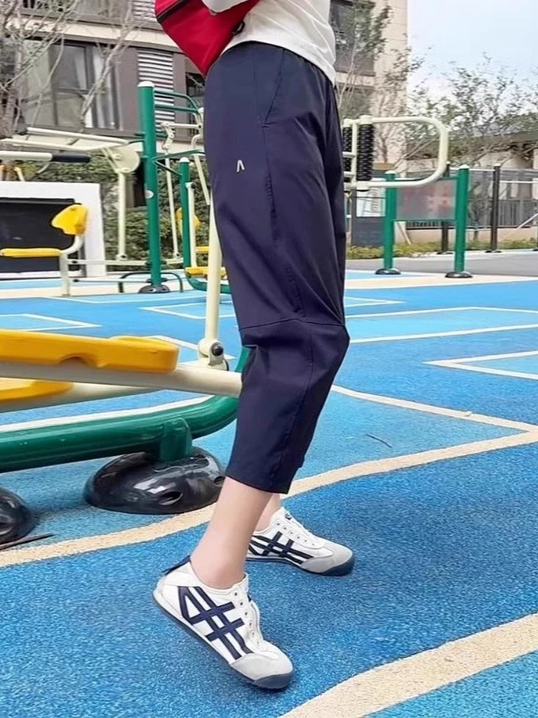 Damskie spodnie sportowe z jedwabiu lodowego Qui Dry, wysoki stan, wyszczuplające, luźny krój, cienkie spodnie typu harlan/marynarka na lato 2025, długość 7/8.