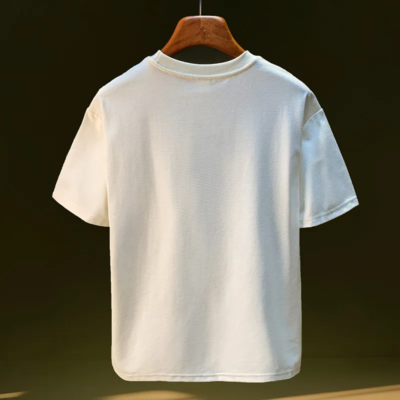 New summer 2025 spliced short sleeved T-shirt for men with a niche design