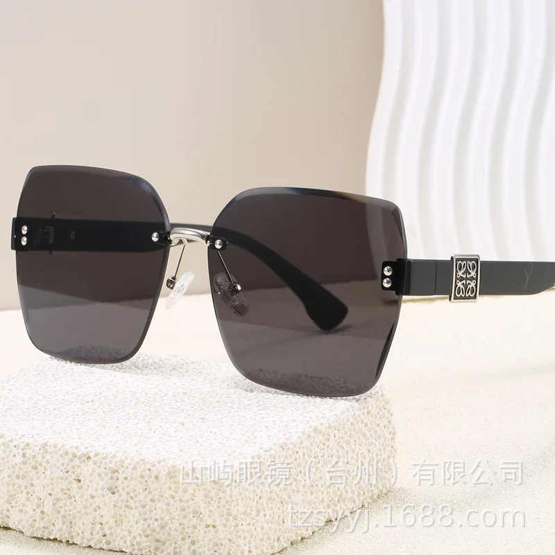 

​ ​ 2025 Новые безрамочные солнцезащитные очки для женщин, роскошные премиальные солнцезащитные очки с защитой от ультрафиолета, модный модный мастер-дизайн, хит продаж, универсальные ​