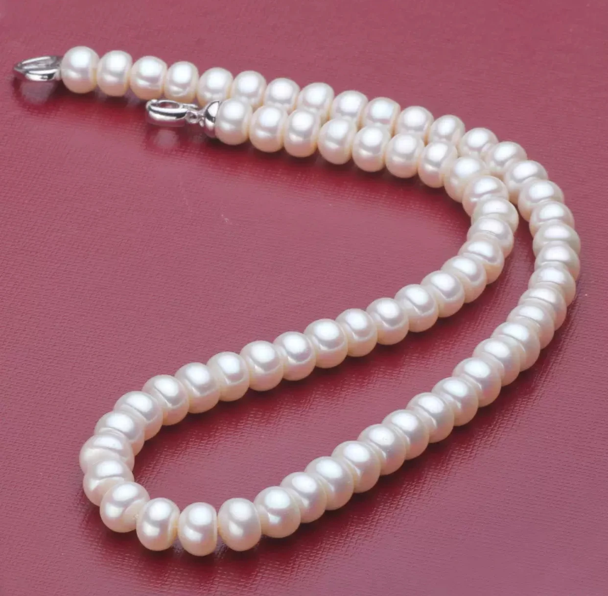 

43*7- 12mm luxurious freshwater pearls, four-sided flat round pendant, high-end, strong light, almost flawless, fashionable