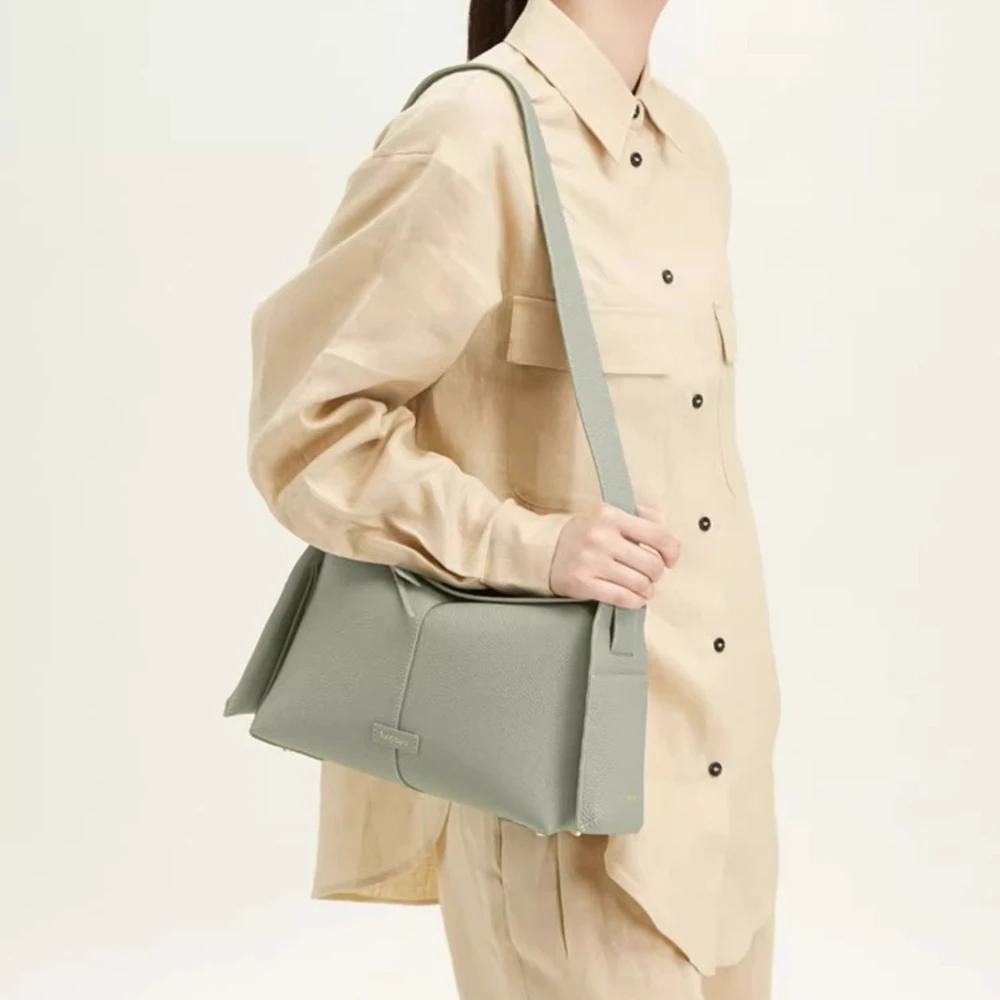 Songmont hanging ear series eaves bag designer new head layer cowhide commuter handheld crossbody hobo bag