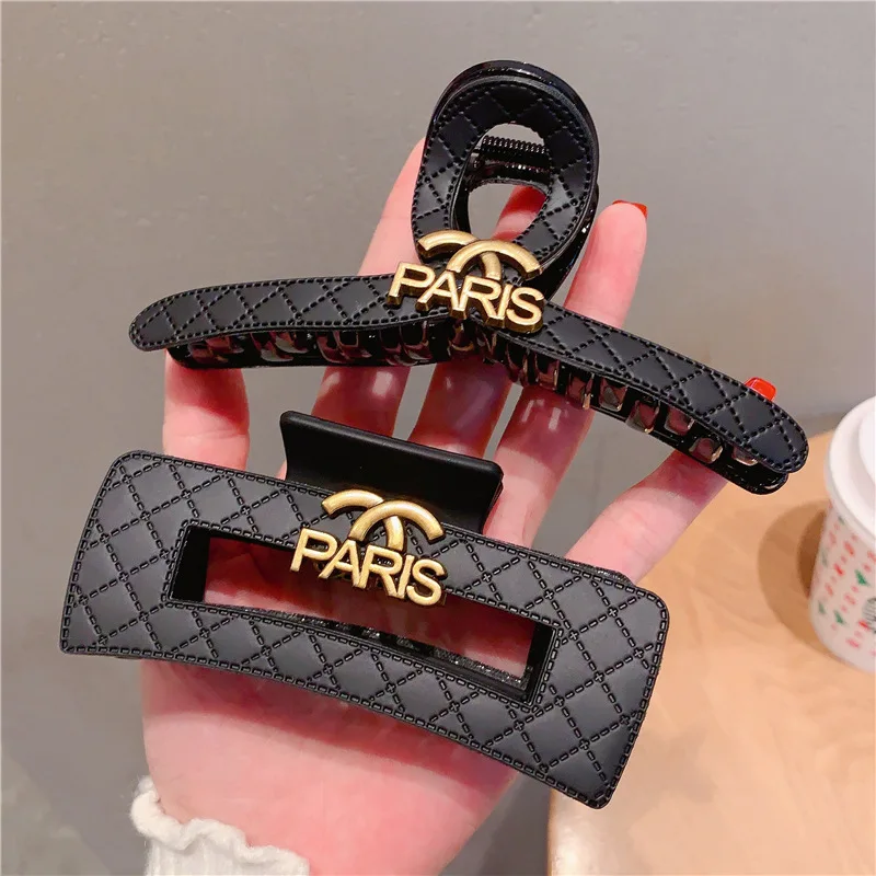 

Rhombus leather disc hair ponytail high grab clip shark clip hairpin women's headdress Japanese and Korean metal letter grab