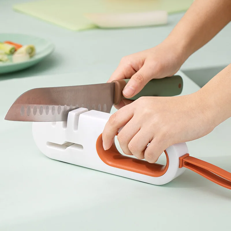 

4 in1 Multifunctional Manual Quick Sharpener Anti Slip Base Household Kitchen Knife Scissor Sharpener Knife Scissors Available