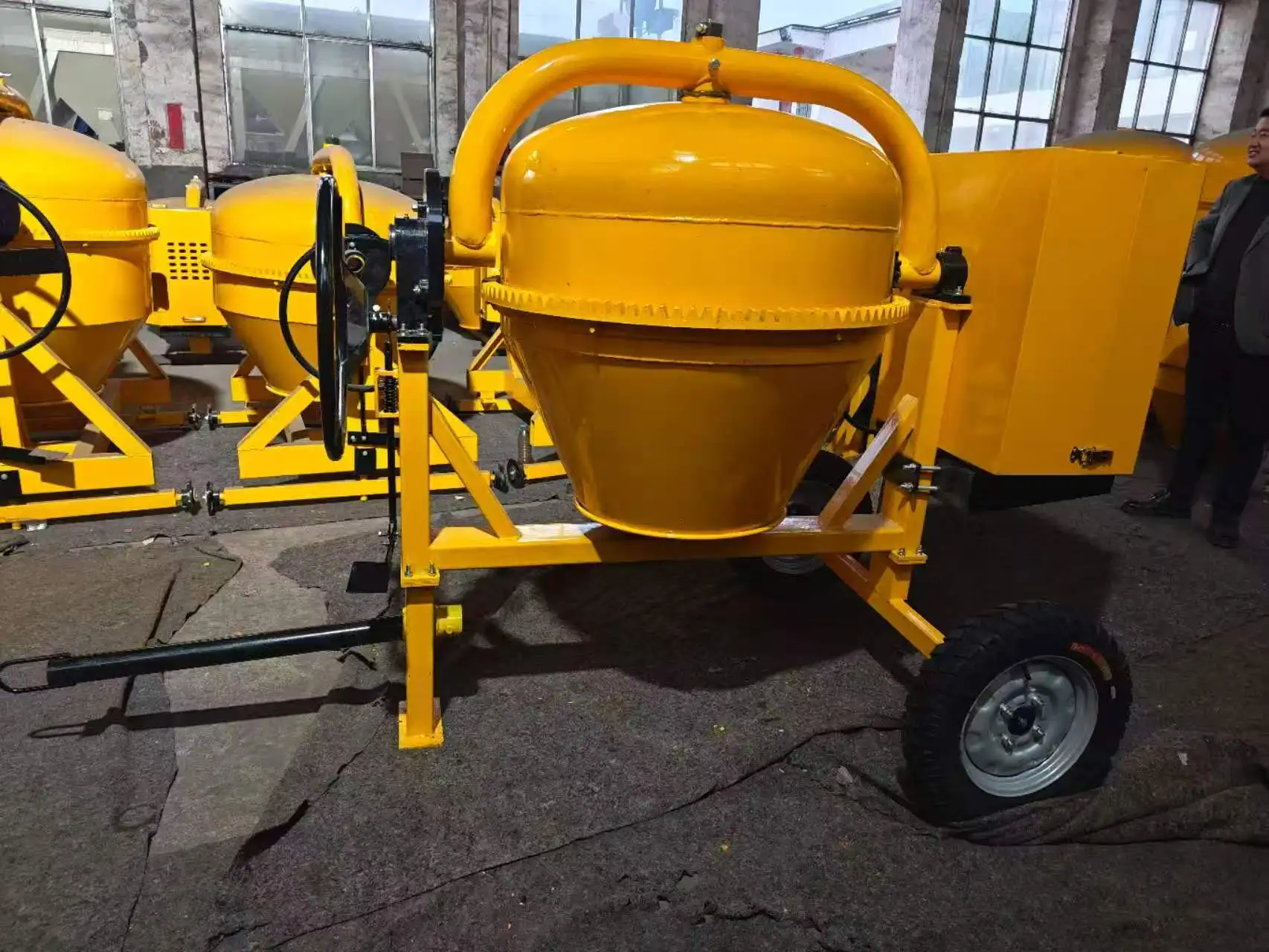 High Quality Portable Self Loading Concrete Mixer Towable Hopper Type