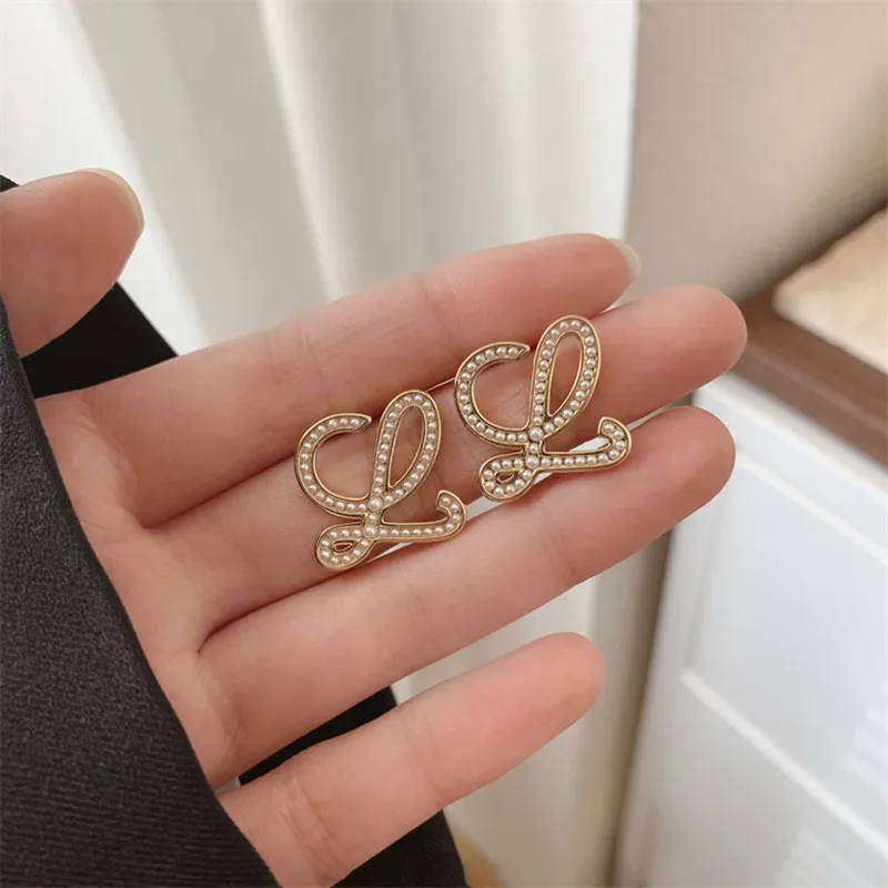 Korean Style Niche Design Pearl Geometry Personality Temperament High-end Unique Earrings for Women Jewelry.