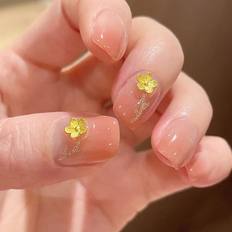 50ชิ้น3D ศิลปะการตกแต่งเล็บอัลลอยรูปดอกไม้สีทองเครื่องประดับเล็บทองชิ้นส่วนโลหะสำหรับตกแต่งเล็บ