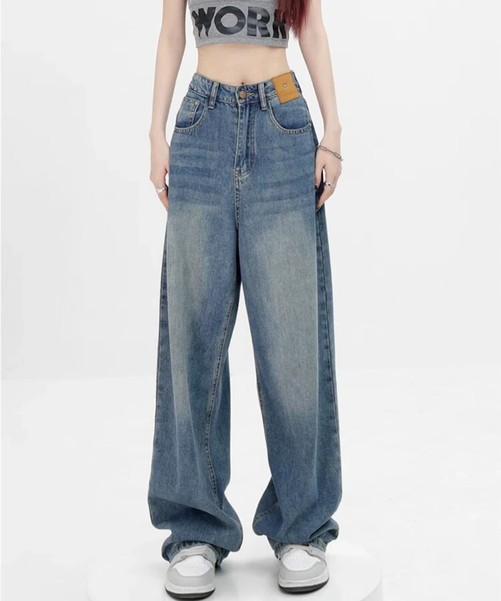 

Blue High-waisted Straight-leg Baggy Jeans for A Woman Showing Thin Wide Legs and Mopping The Floor Baggy Jeans Women