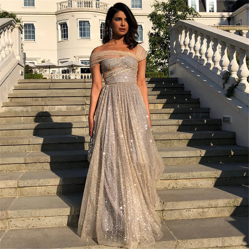 

Sparkle Champagne Sleeveless Evening Dresses 2023 Charming Backless A-Line Sequin Long Formal Evening Gown Vestidos De Fiesta