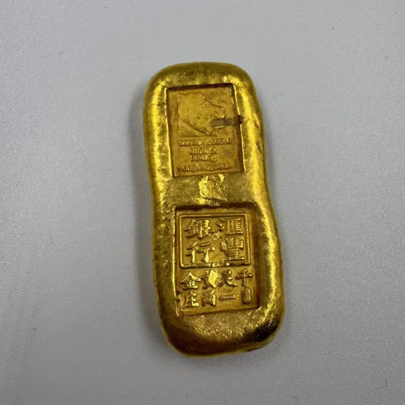 Small yellow fish-shaped ancient copper bars, coins, ingots, gold bricks, brass artifacts for collecting