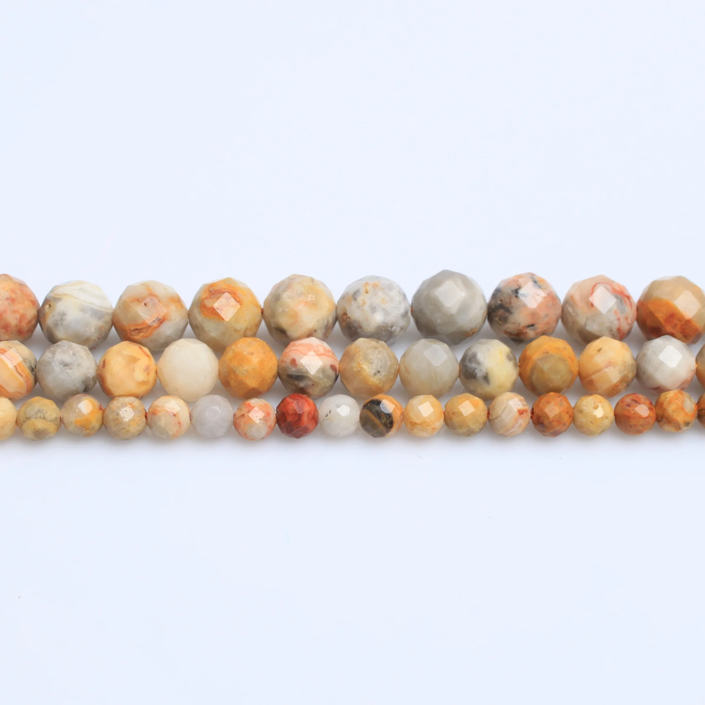 

Factory wholesale natural stone AAA crazy agate handmade engraved beads 6-10mm DIY bracelet accessories Baroque hard cutting