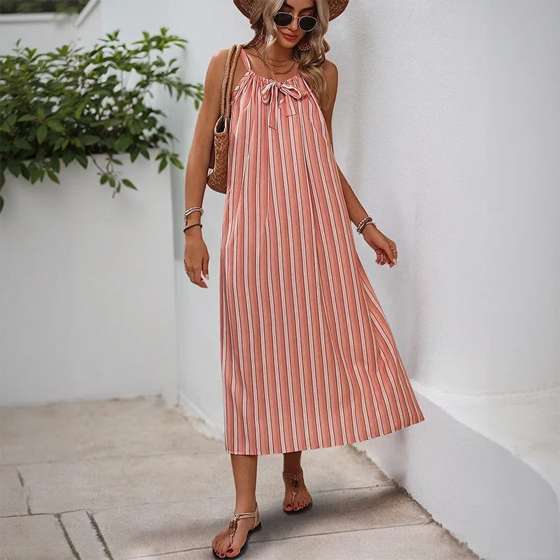 2025 Nueva falda de tirantes dulce y elegante de verano para mujer con vestido suelto a rayas con lazo