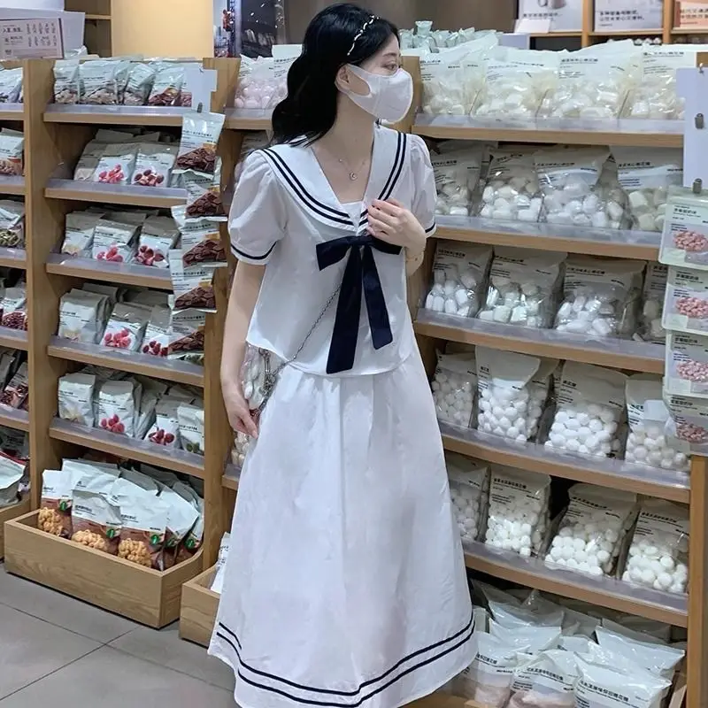 

Sweet contrasting color bow navy collar short sleeved shirt+high waisted A-line loose half skirt summer trendy two piece set