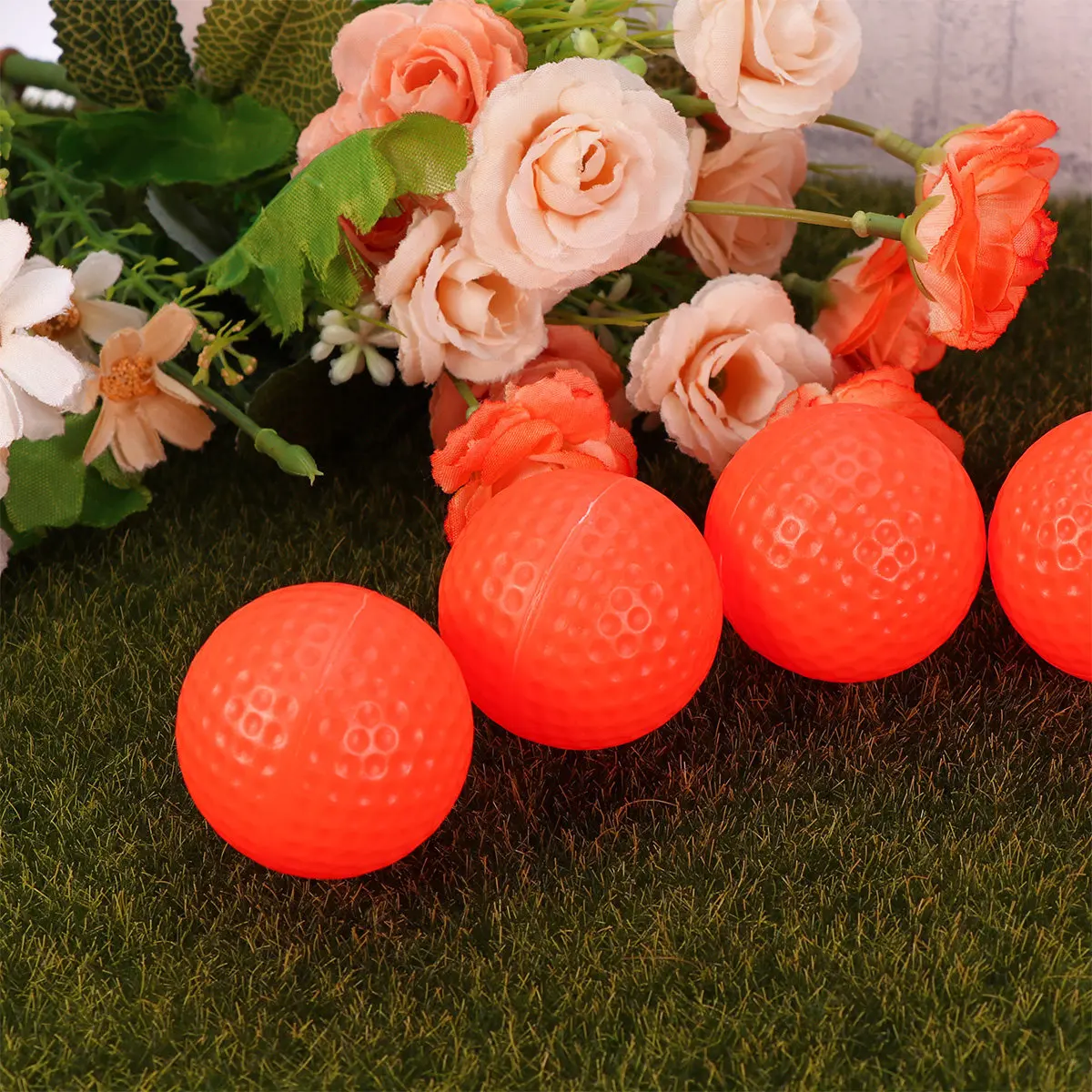 

12Pcs Indoor Golf Practice Balls Premium PP Lightweight Low Impact Bright Orange Color for Full Shot Approach Drills Training