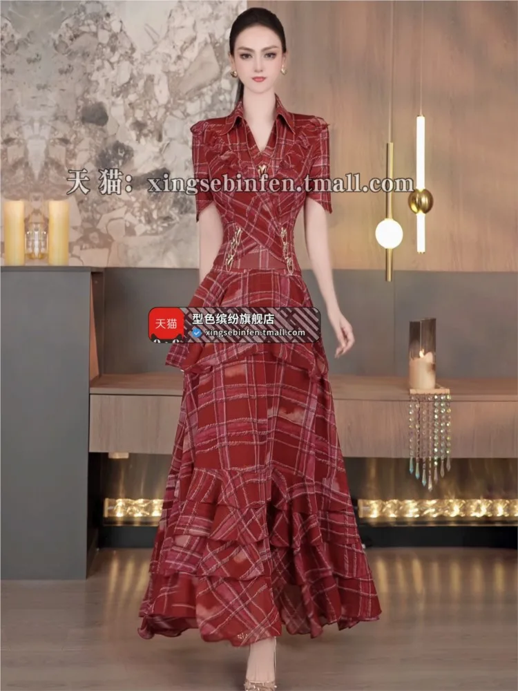 A new youthful set of two-piece plaid pleated shirt and irregular ruffled skirt