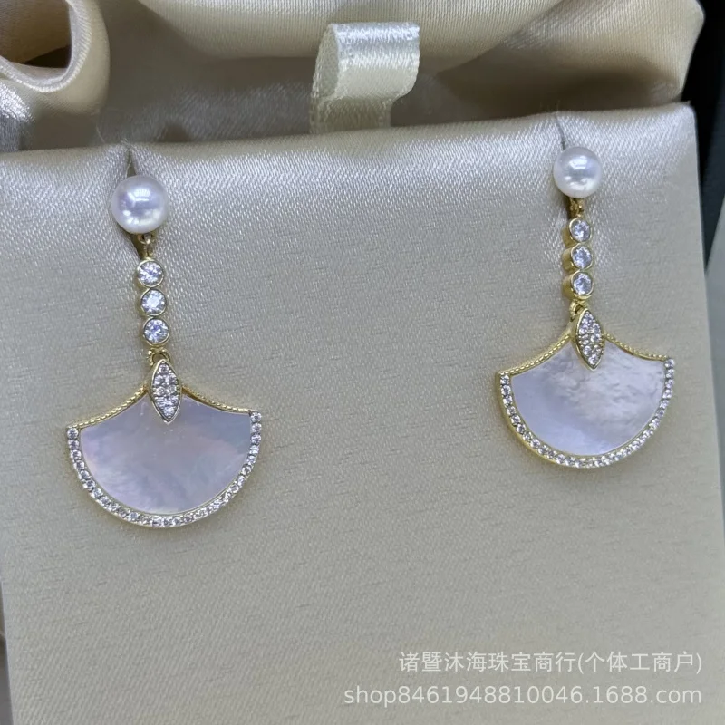 

Серьги-гвоздики с листьями гинкго, натуральный пресноводный жемчуг, круг АК, серебро S925