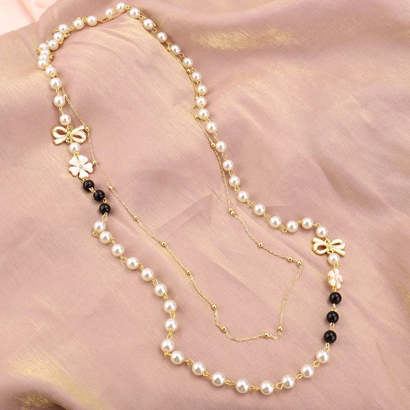 Kamelia Bow perła biżuteria wielowarstwowy długi naszyjnik dla kobiet Bijoux moda klasyczne koraliki sweter łańcuszek naszyjniki