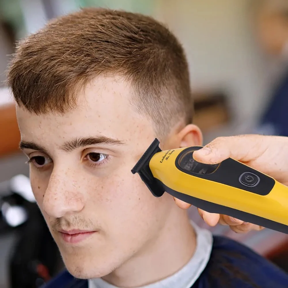 

Машинка для стрижки волос и бороды KEMEI 1921, профессиональная, 9000 об/мин, для парикмахеров, с Т-образным лезвием Zero Gap, 2 модульные насадки