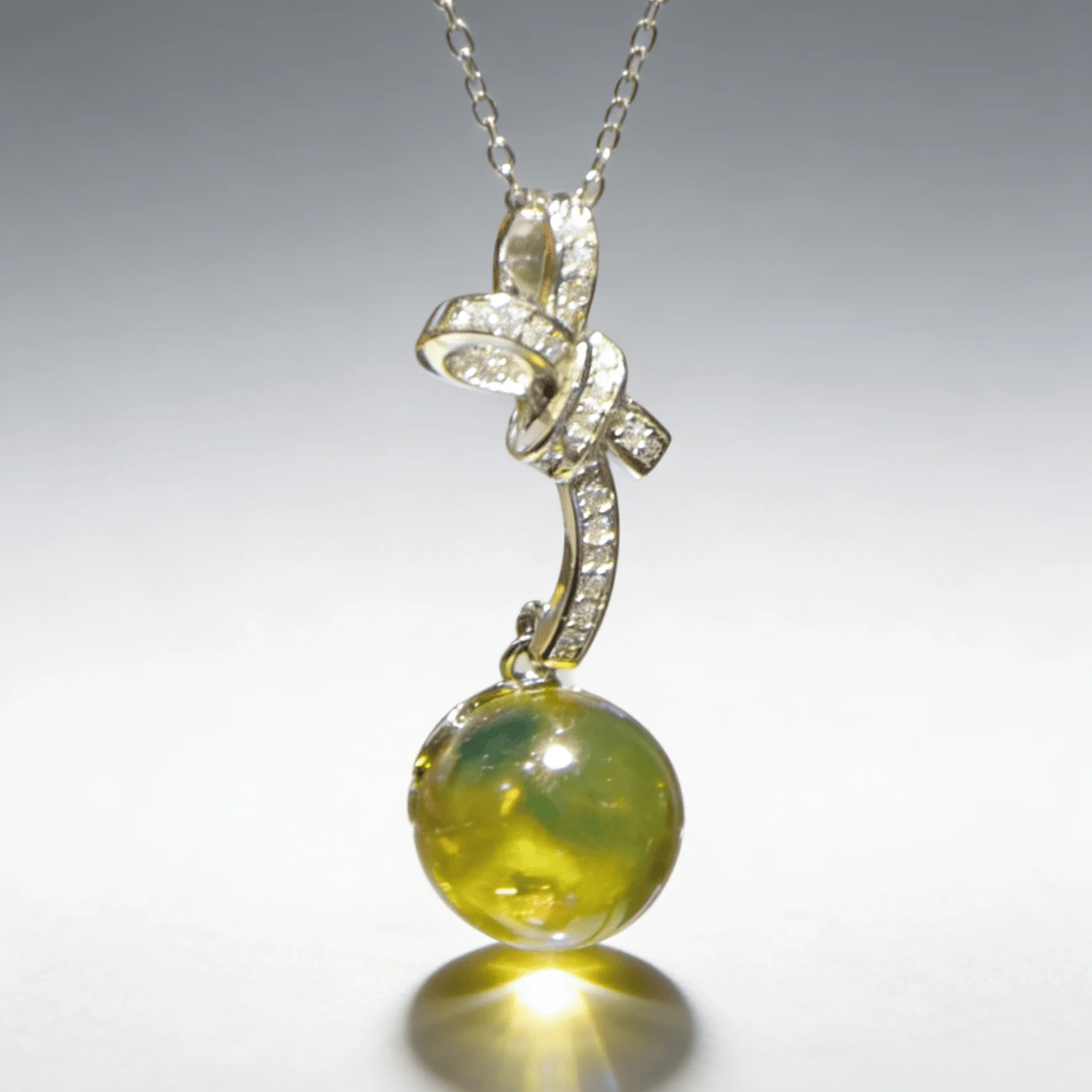 

Sterling Silver Natural Mexican Blue Amber Bow Drop Pendant 10mm Round Sweet Romantic Elegant Jewelry