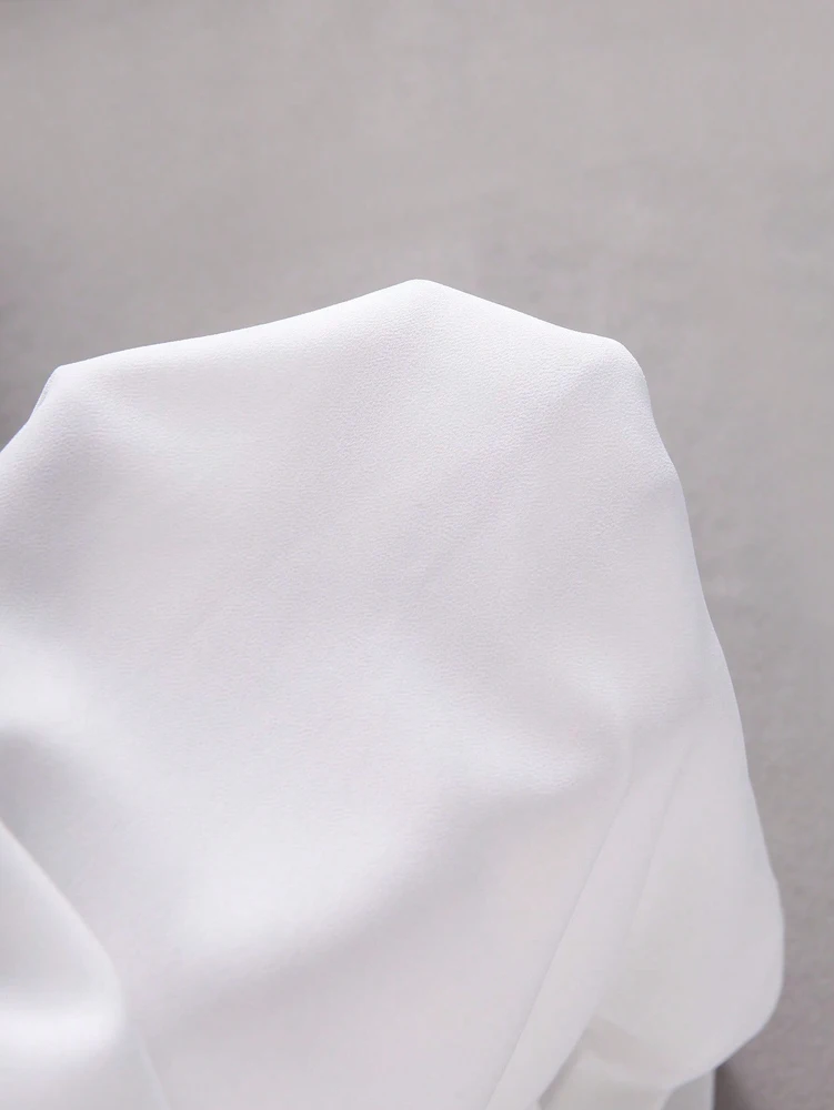 Plus-Size Damen Herbst 2026 Freizeitkleidung, einfarbiges Kurzarmhemd mit Rüschenärmeln, Schleifendetail und asymmetrischem Saum. – Detail 7