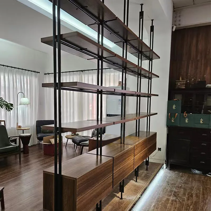 

Italian minimalist bookshelf office stands tall with partition shelves in the living room, subway art bookshelves and wall-to-wa