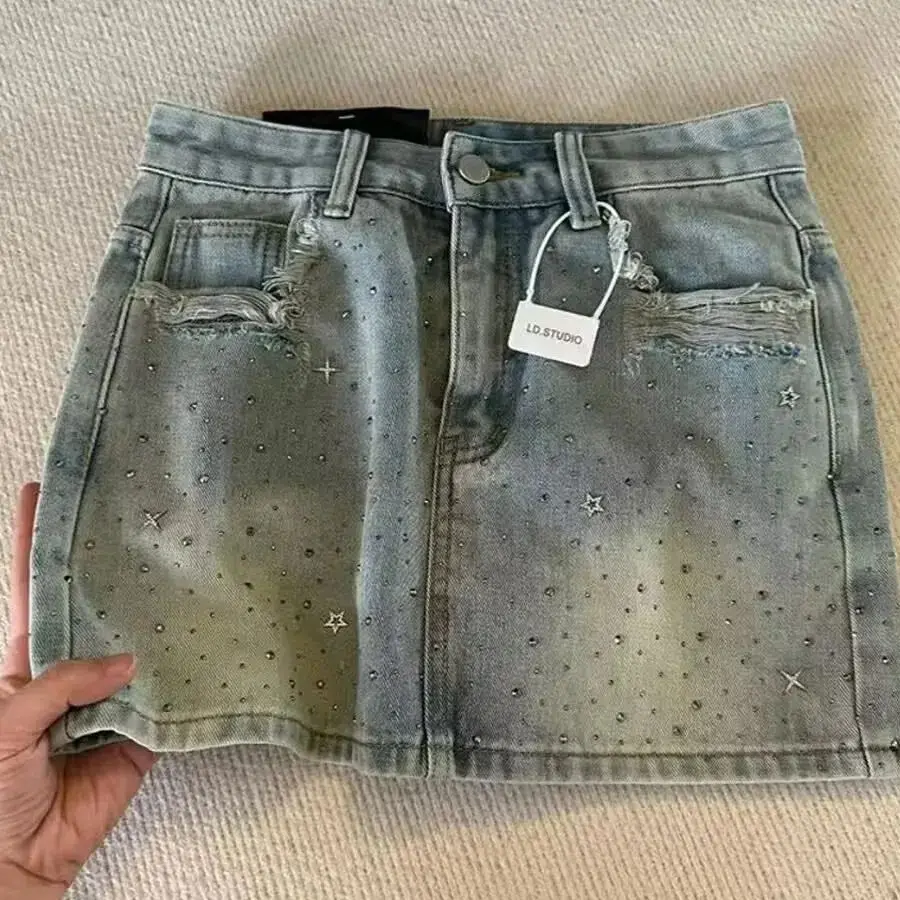 

Летние женские мини-джинсовые юбки трапециевидной формы со стразами в корейском стиле, уличная одежда для девочек, стильные 4XL, шикарные винтажные джинсовые юбки со звездами