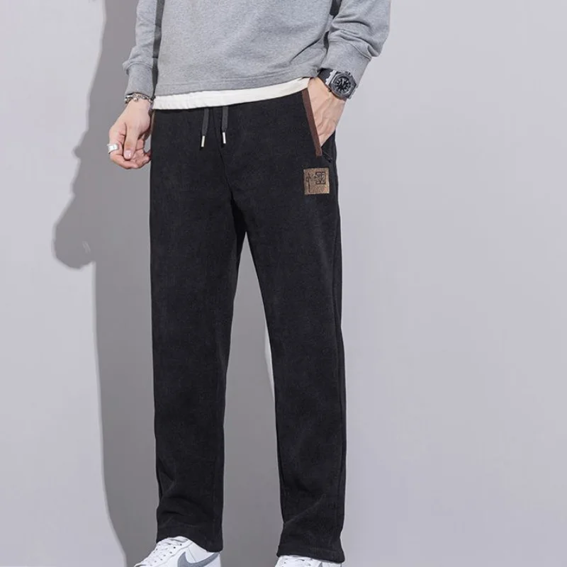 الرجال سراويل شتوية موضة ملابس كاجوال رياضية تمتد السراويل الخريف ملابس رجالية فضفاضة تناسب المخملية الملابس الدافئة نمط جديد