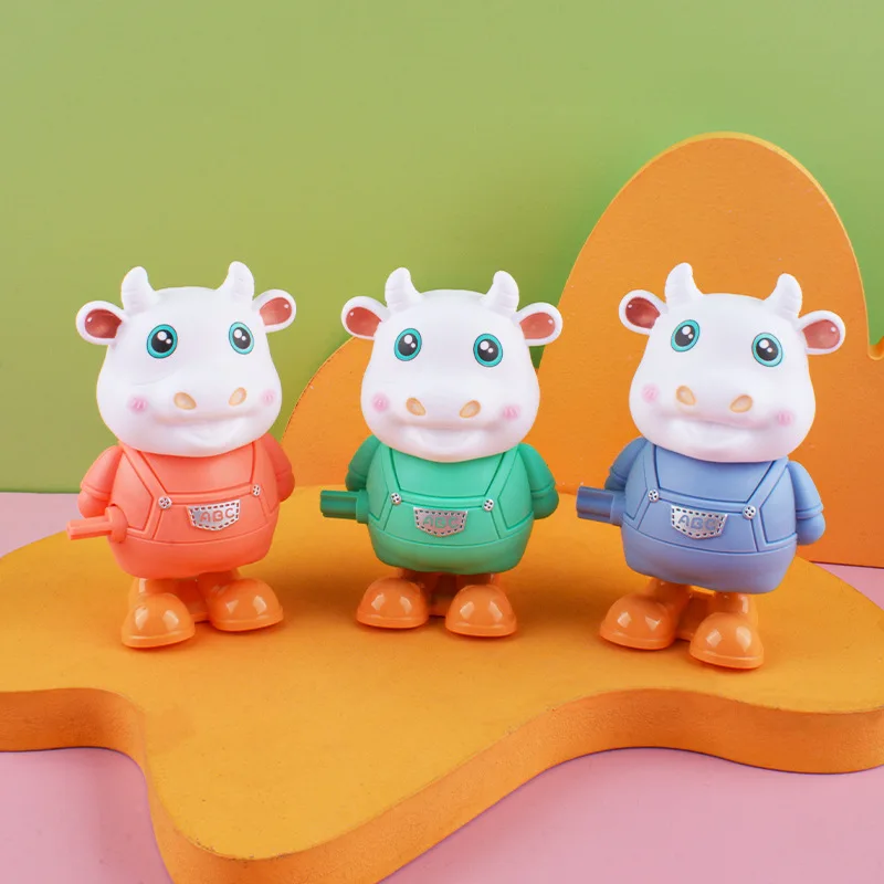 1Pcs New Cartoon children's Clockwork Winding Jumping Cow Toy Lovely Cute Little Cow Toy giocattolo per bambini regalo di compleanno Fun Prize Toy