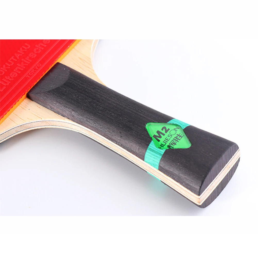 

Table Tennis Racket with 5 Ply Basswood and 2 Ply Carbon to Enhance Ball Speed Spin and Control in Competitive Play