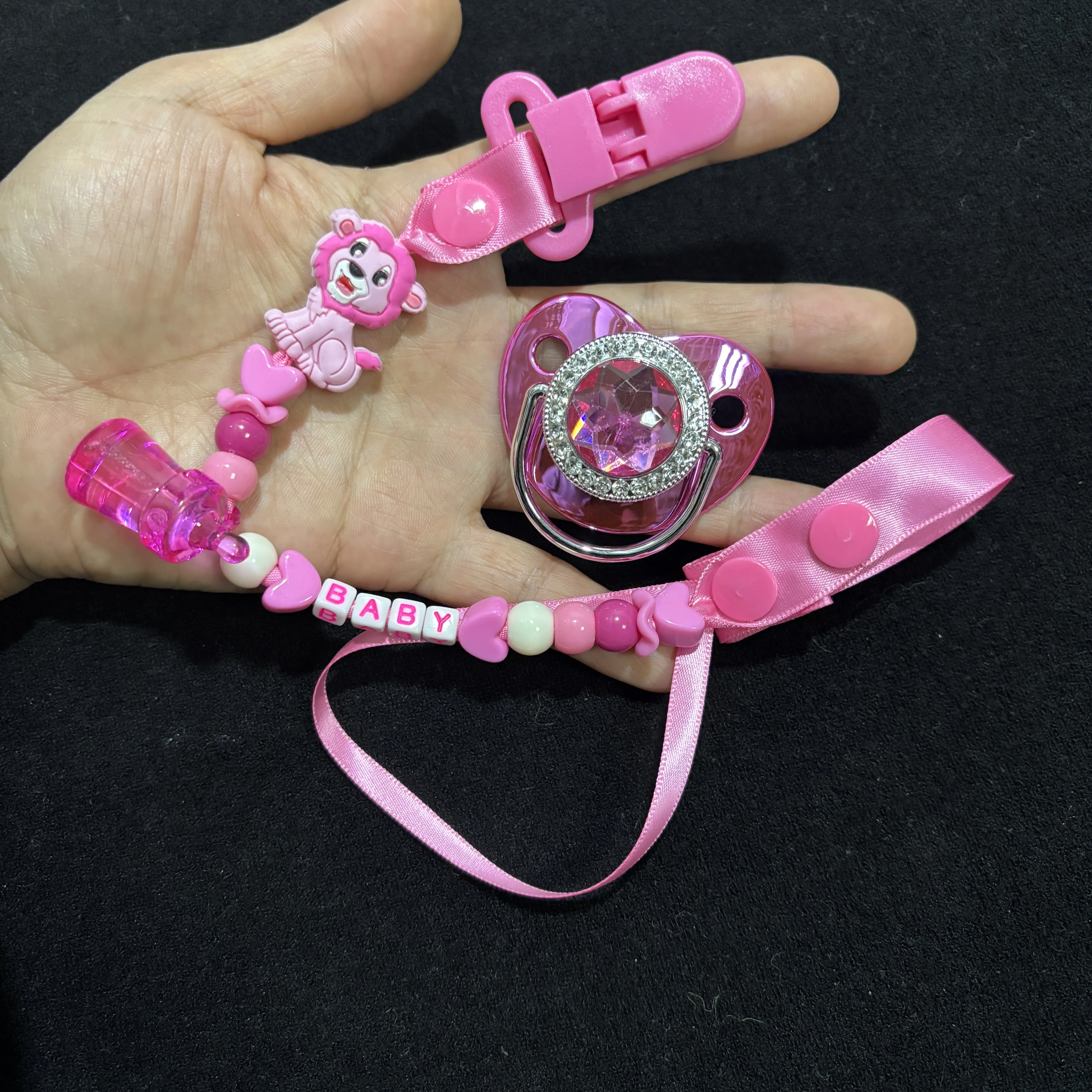 

Newborn Girl Pacifier Clip with Angel Wings & Bling Heart Dummy - Pink Beaded Chain Teething Accessory