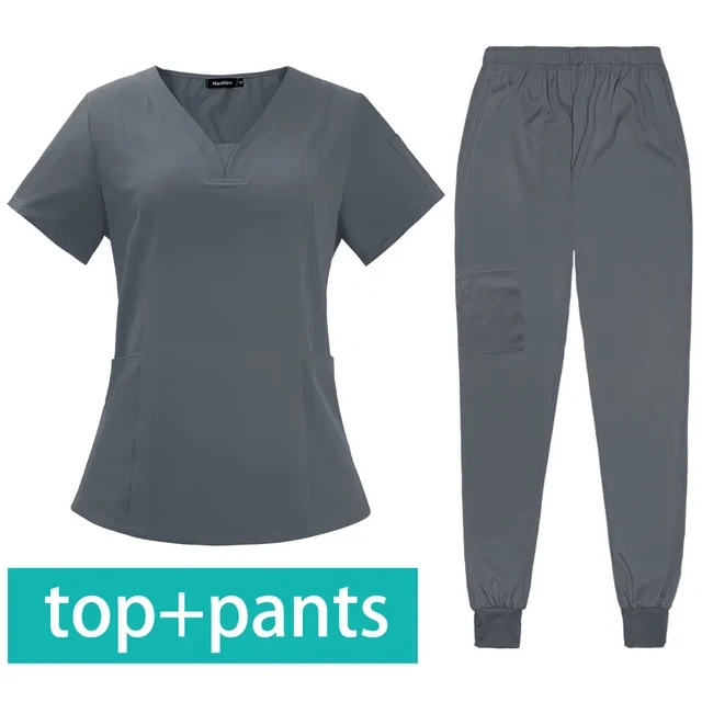 Conjunto de uniforme de Hospital Dental Unisex, bata quirúrgica de Color sólido con bolsillo y cuello en V, trajes exfoliantes de moda para mujer, venta al por mayor