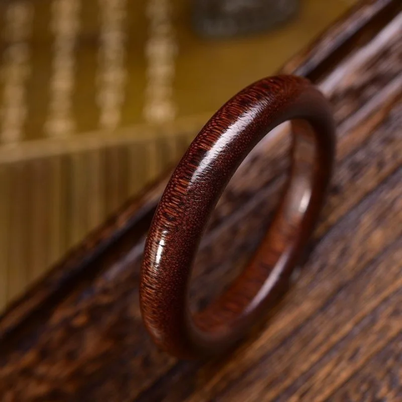 

Рог гиппопотама с естественными узорами роста, кроваво-красный браслет, коллекционный предмет из черного золота, высокая эстетическая ценность