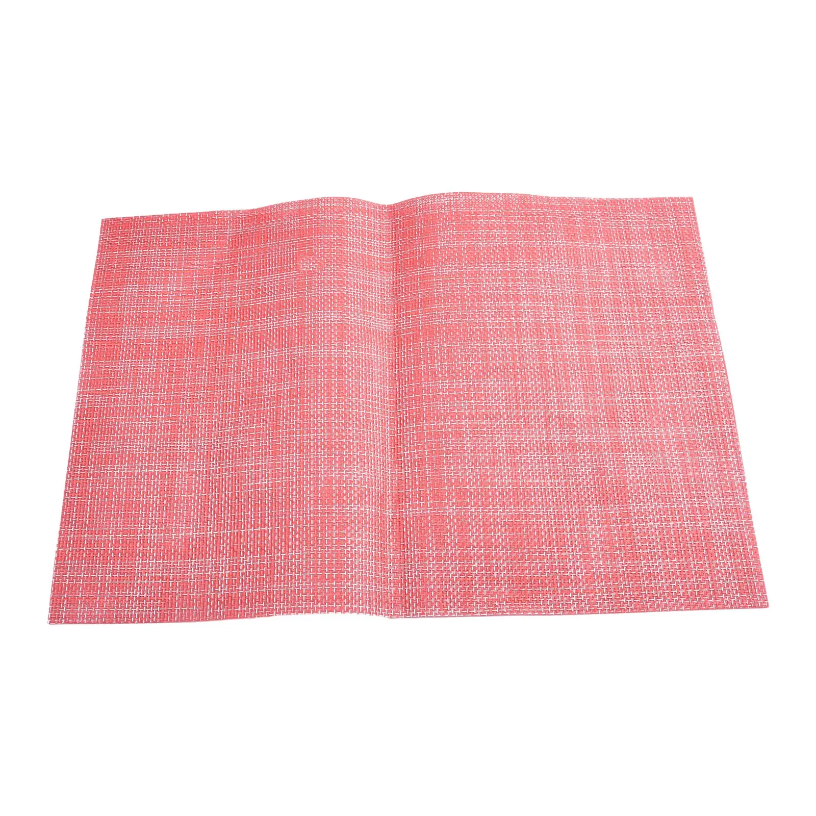 Solid color woven placemat made of PVC designed for household dining tables to provide heat resistance and anti slip benefits
