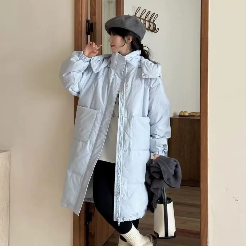 

Новинка 2025 года, зимнее пальто в корейском стиле для женщин, утолщенная свободная хлопковая куртка выше колена, теплая модная длинная верхняя одежда