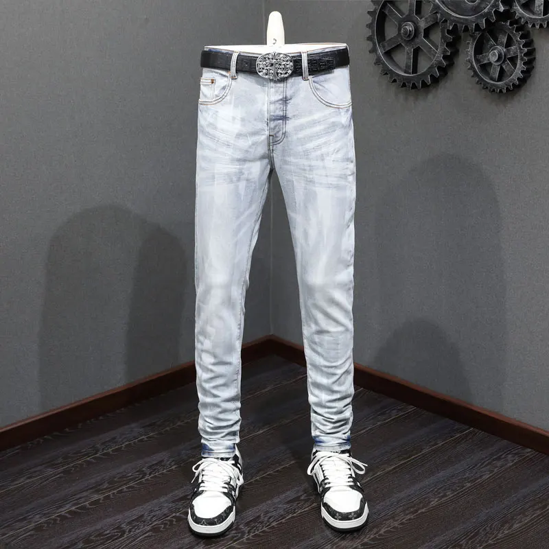 

Designer fashion new light blue jeans with pleated elastic slim fit perforated patch jeans, high street fashion hip-hop brand pa